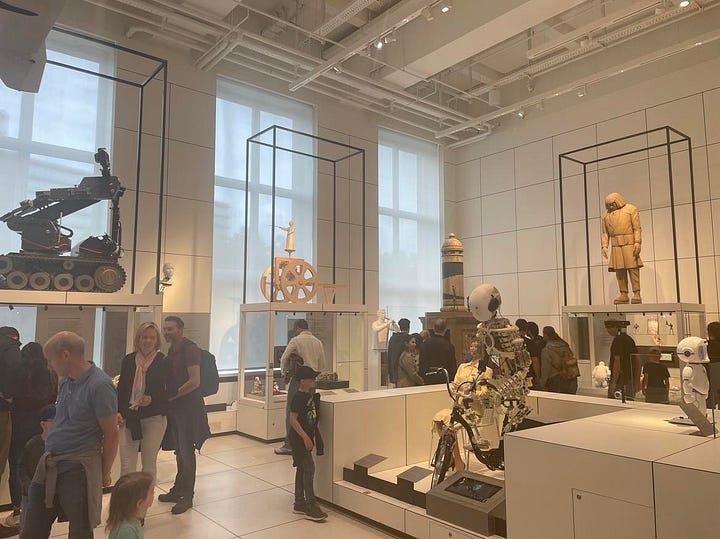 various robots in a museum room
