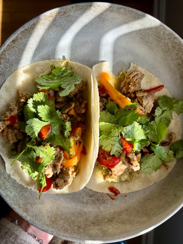 green salsa turkey tacos with bell peppers, avocado, and fresh cilantro
