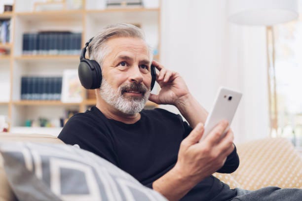 9,300+ Man Listening To Podcast Stock Photos, Pictures & Royalty-Free  Images - iStock | Business man listening to podcast, Black man listening to  podcast, Older man listening to podcast