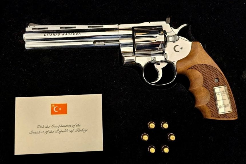 Turkey's leader gives revolvers to every NATO leader as parting gift | CNN