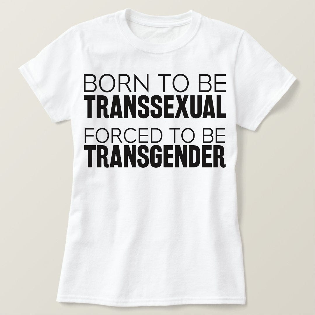 A novelty T-shirt reading "BORN TO BE TRANSSEXUAL / FORCED TO BE TRANSGENDER".