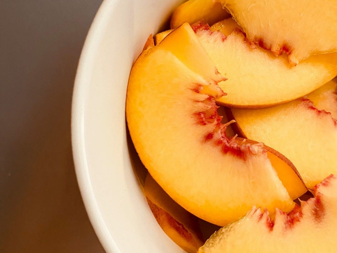 sliced fruit in white ceramic bowl sliced fruit in white ceramic bowl