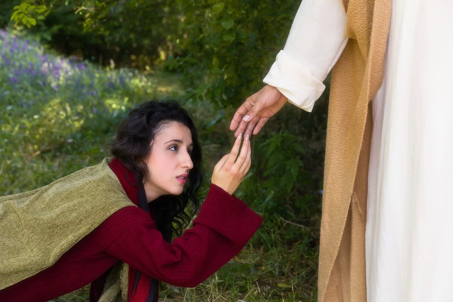 Touching the fringe of Jesus' garment
