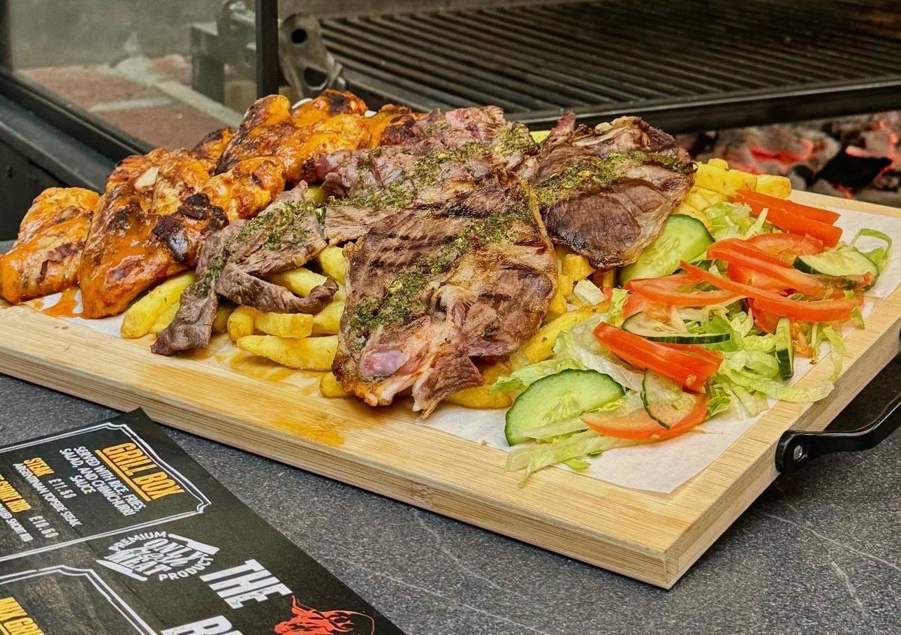 May be an image of souvlakia, gyro and text May be an image of souvlakia, gyro and text