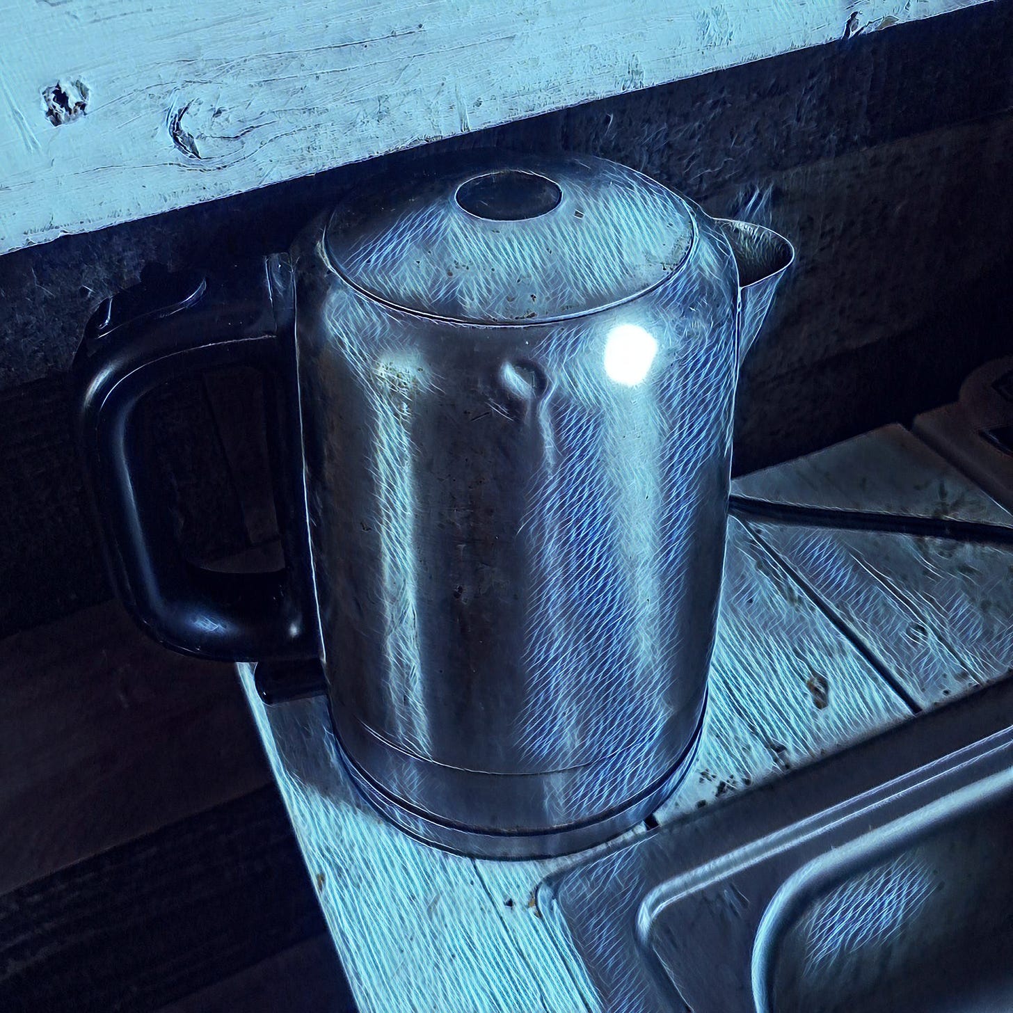 The kettle rattled as water bubbled toward a welcome boil