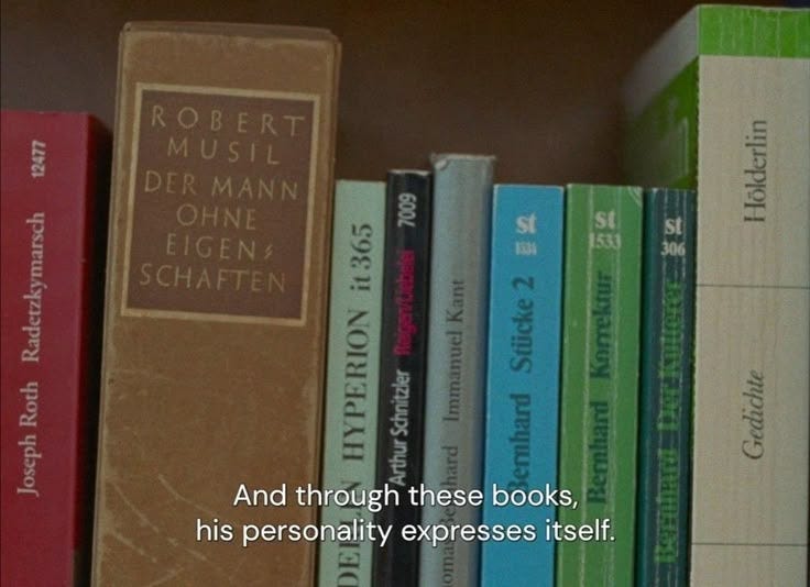 This may contain: there is a book shelf with many books on it and the caption reads robert musial der mann, obeeine schaffen