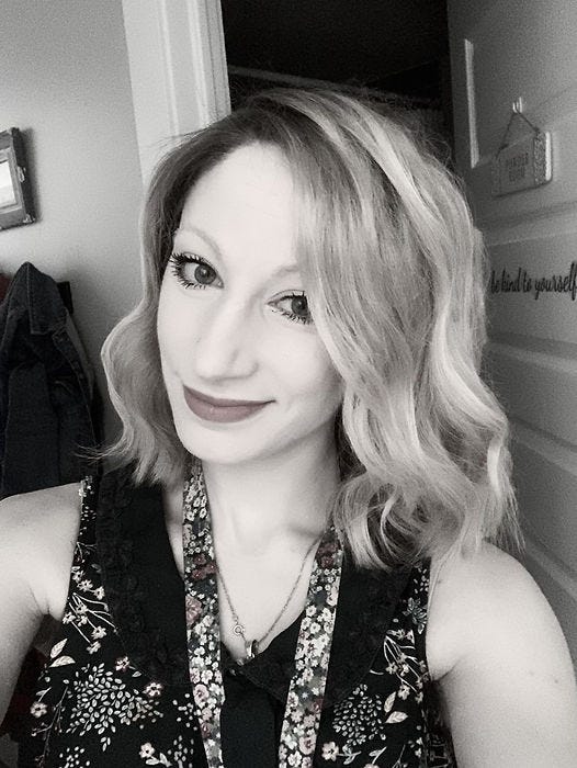 Black and white image of the author, Nikki Kennedy.