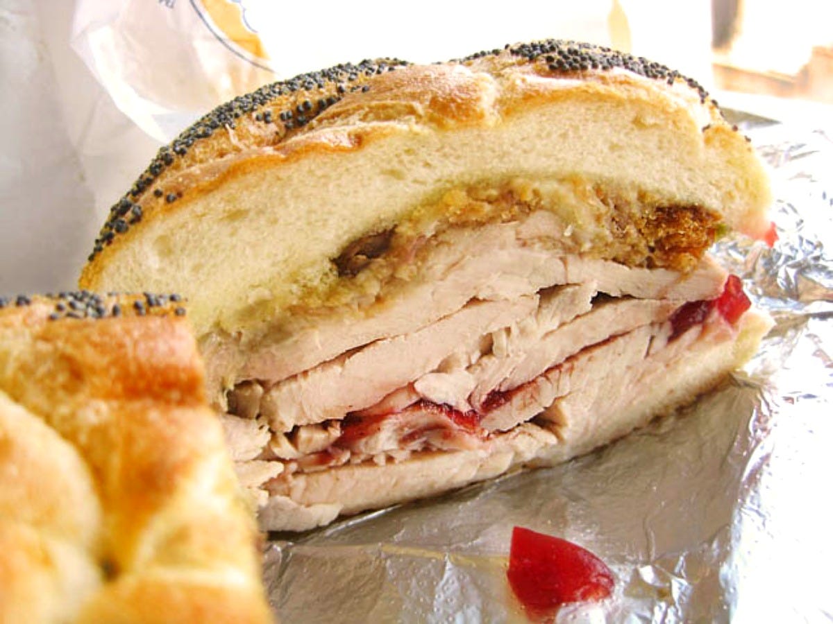 A turkey sandwich with stuffing and cranberry. Image: Jason Lam via Wikimedia Commons