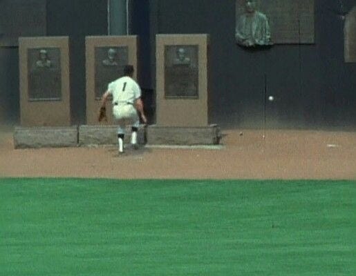 Outfielder Bobby Murcer attempts to play a batted ball after it caroms of the outfield monuments at Yankee Stadium. Outfielder Bobby Murcer attempts to play a batted ball after it caroms of the outfield monuments at Yankee Stadium.