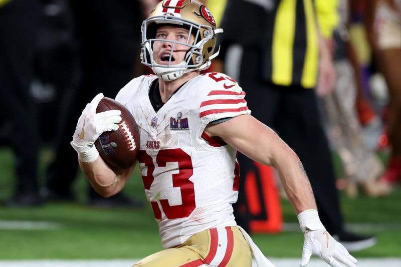 LAS VEGAS, NEVADA - FEBRUARY 11: Christian McCaffrey #23 of the San Francisco 49ers runs the ball for a touchdown in the second quarter against the Kansas City Chiefs during Super Bowl LVIII at Allegiant Stadium on February 11, 2024 in Las Vegas, Nevada. (Photo by Steph Chambers/Getty Images)
