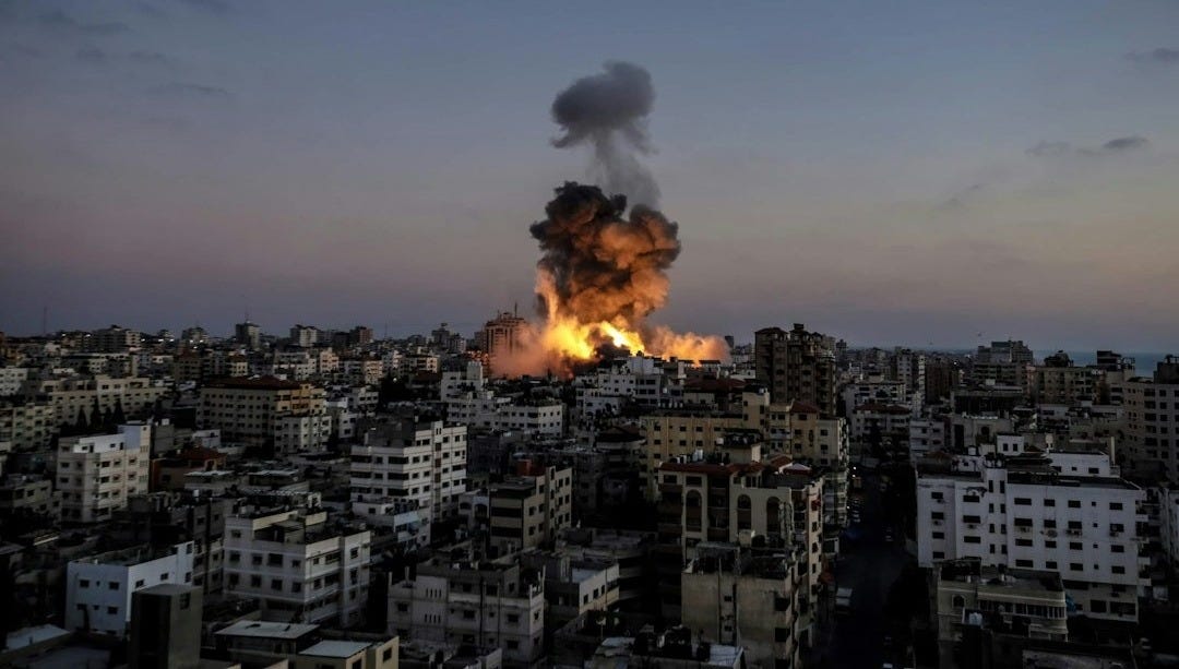 A large fire is burning in a city