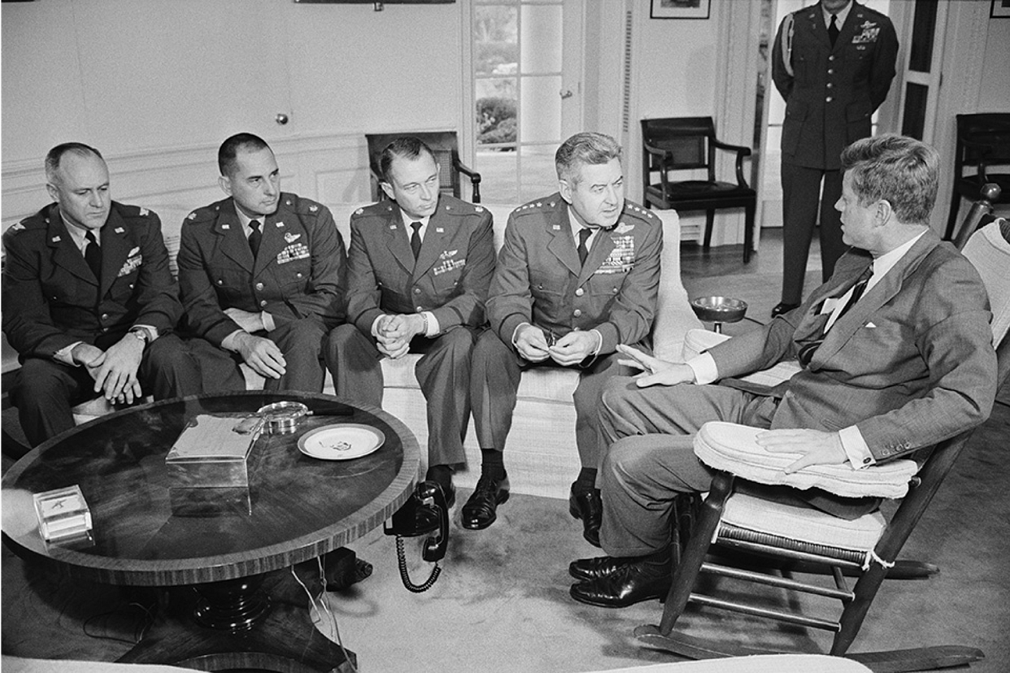 President Kennedy meets General Curtis LeMay and the Joint Chiefs after the Cuban Missile Crisis — a briefing so hostile LeMay accused JFK of ‘appeasement.’ The military wanted airstrikes. Kennedy refused.