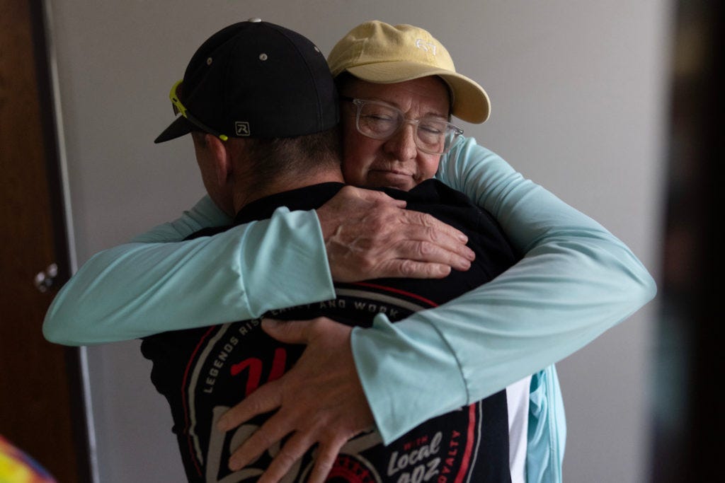 UAW Local 402 members embrace at the union hall in Springfield, Ohio, on the plant's last day, Sept. 30, 2026 UAW Local 402 members embrace at the union hall in Springfield, Ohio, on the plant's last day, Sept. 30, 2026