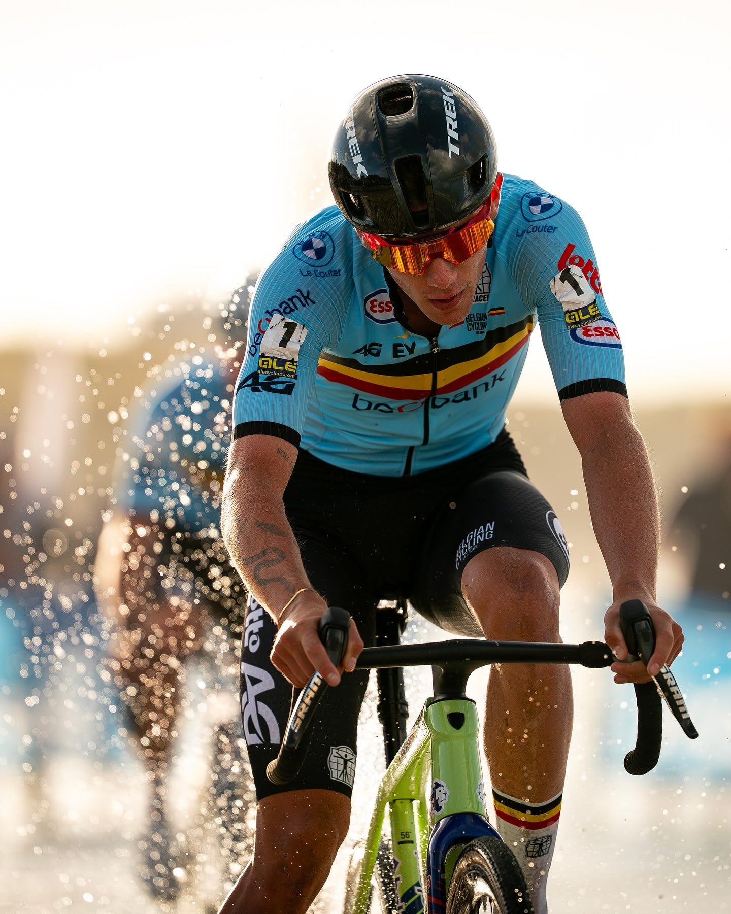 May be an image of bicycle and text