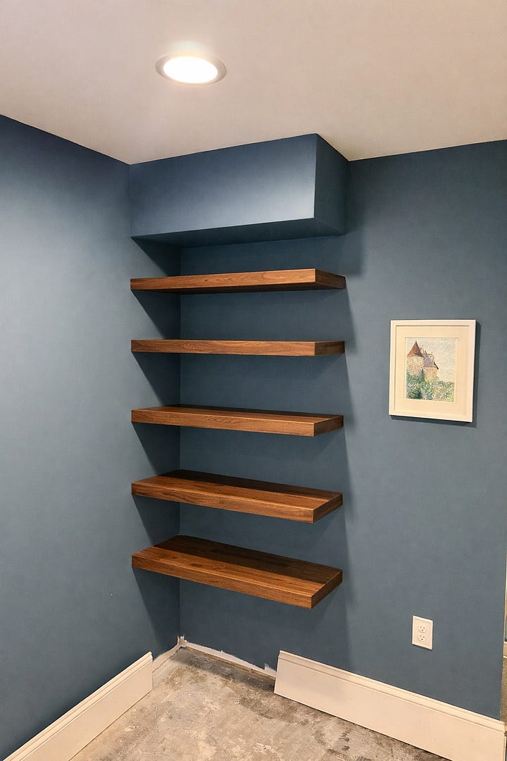 Four ai-generated images of a built-in bookcase in the corner of my office.