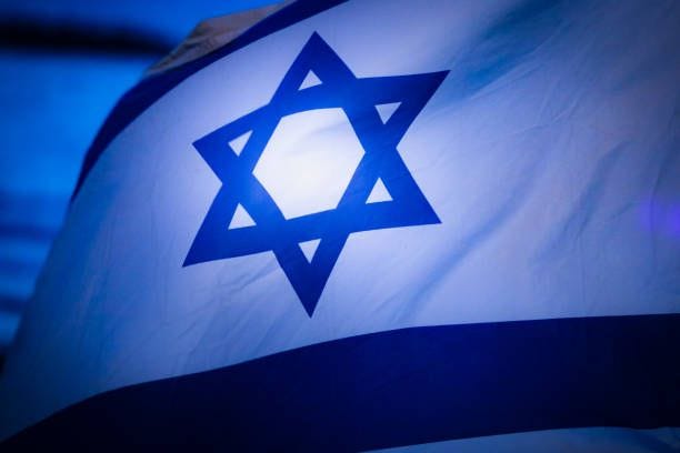 ISRAEL FLAG IN THE WIND ISRAEL FLAG IN THE WIND israel flag stock pictures, royalty-free photos & images