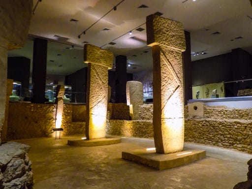 Reproduction of T-shaped pillars from Enclosure D, Göbekli Tepe, with engraved arms, displayed in the Şanlıurfa museum