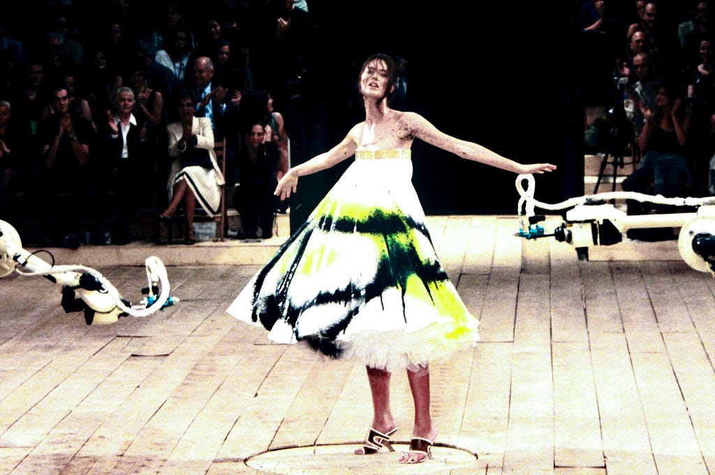 Shalom Harlow in dress No. 13 during the Alexander McQueen spring-summer 1999 London Fashion Week show. Photo: Victor Virgile / Gamma-Rapho via Getty Images.