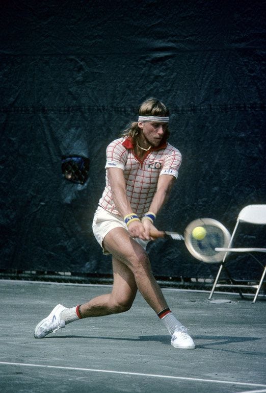 Tennis player Bjorn Borg from Sweden hits a backhand return against...