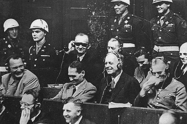 r/HistoryPorn - German war criminals laugh at a translation mistake during the Nuremberg Trials, 1945. (962 x 709)