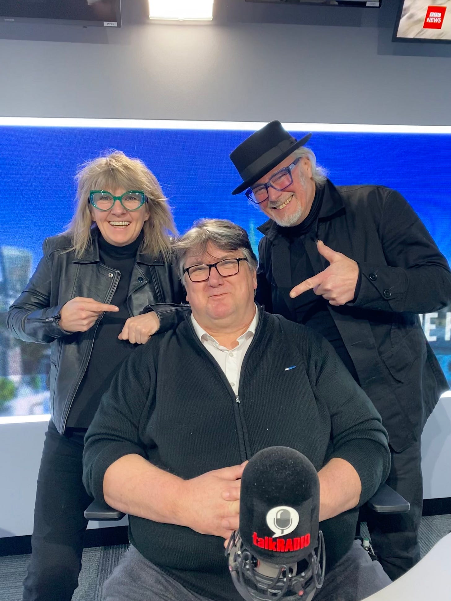 Suzy Starlitem Simon Campbell with Bob Mills in the studio at Talk Radio, London