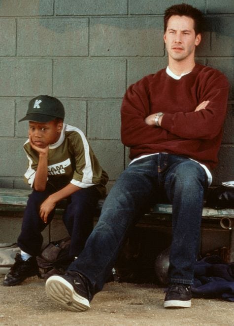 DeWayne Warren and Keanu Reeves in the movie Hardball