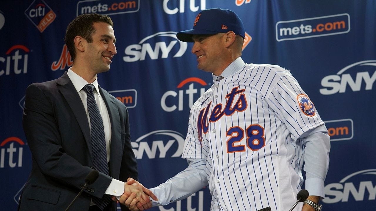 David Stearns introduces Carlos Mendoza on Tuesday, Nov. 14, 2023 at Citi Field in New York.