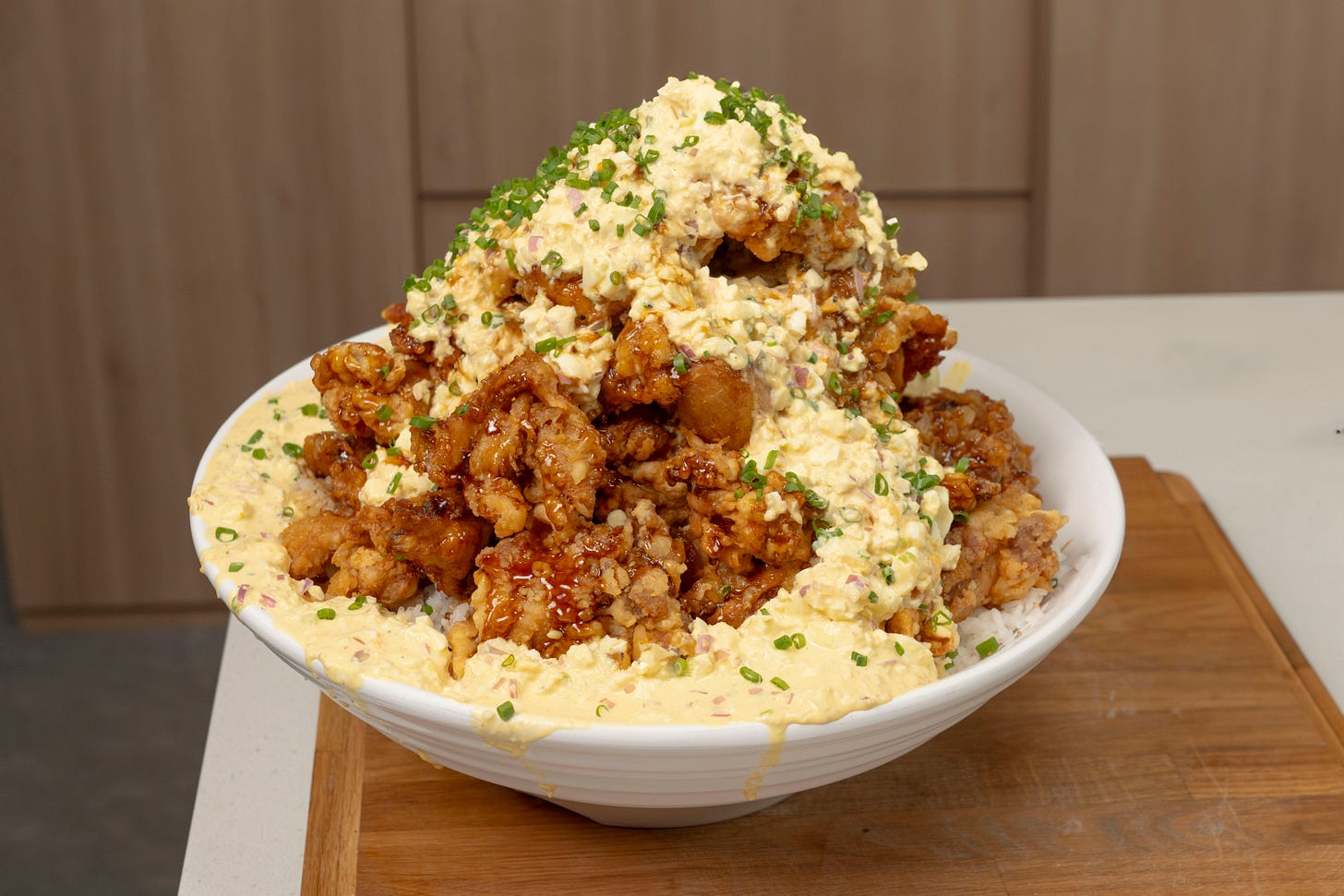 a big bowl of chicken nanban overflowing with eggs