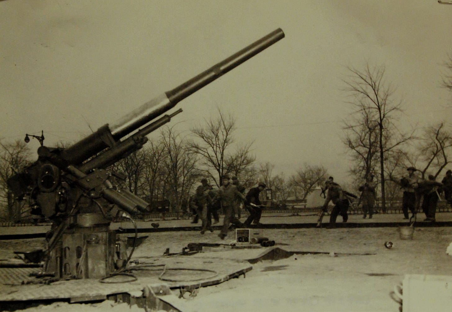 An anti-aircraft gun crew demonstrates its work in New York during the winter of 1941–42.