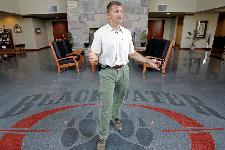 FILE - In a July, 21, 2008 file photo, founder and CEO of Blackwater Worldwide Erik Prince is seen at Blackwater's offices in Moyock, N.C. Holland, Mich. native Erik Prince will be talking about his west Michigan roots at a Tulip Time Festival luncheon on Wednesday May 5, 2010. Prince is the son of the late Edgar Prince, a leading auto supplier in Holland, Mich. and brother to former Michigan Republican Party Chairwoman Betsy DeVos. (AP Photo/Gerry Broome, File) FILE - In a July, 21, 2008 file photo, founder and CEO of Blackwater Worldwide Erik Prince is seen at Blackwater's offices in Moyock, N.C. Holland, Mich. native Erik Prince will be talking about his west Michigan roots at a Tulip Time Festival luncheon on Wednesday May 5, 2010. Prince is the son of the late Edgar Prince, a leading auto supplier in Holland, Mich. and brother to former Michigan Republican Party Chairwoman Betsy DeVos. (AP Photo/Gerry Broome, File)