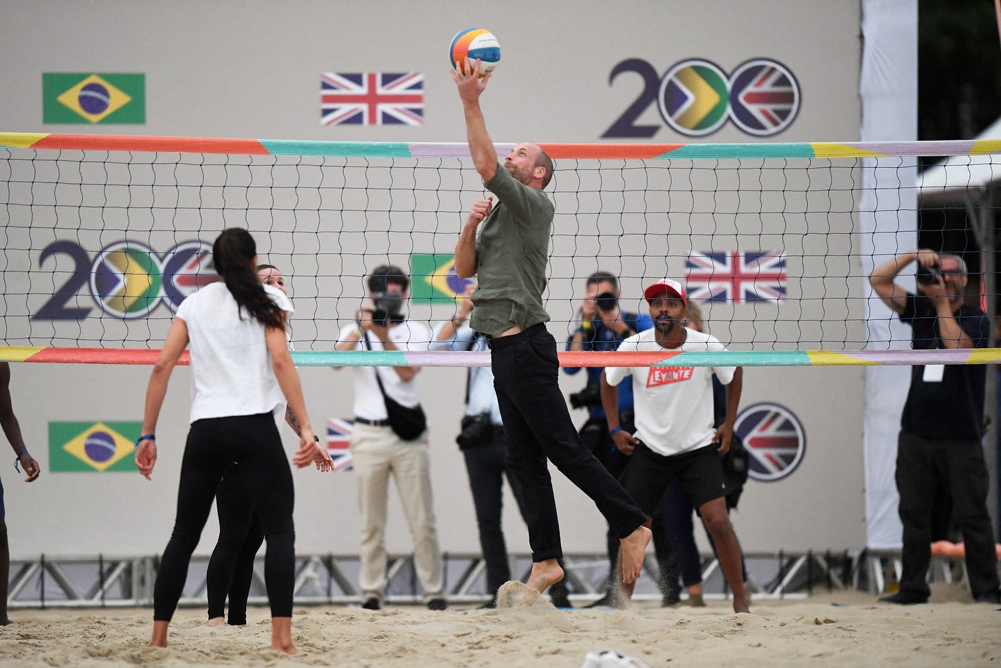Prince William playing volleyball Prince William playing volleyball