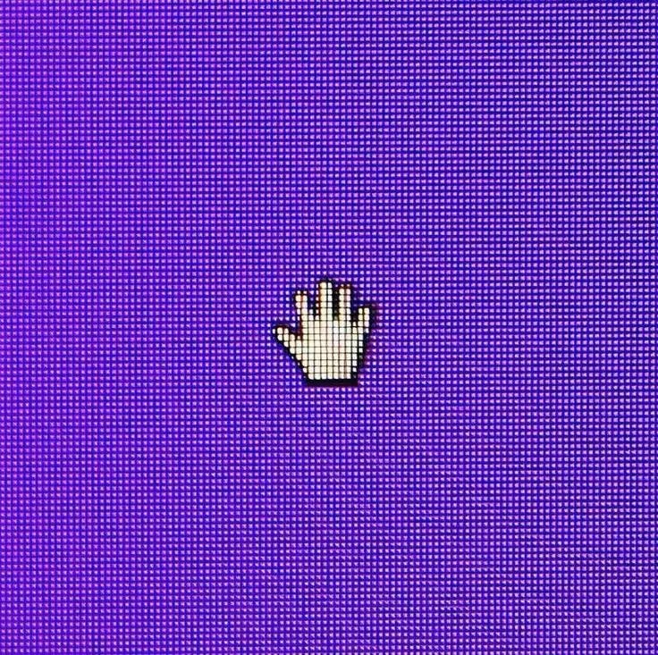 This may contain: a pixelated image of a hand reaching up to touch the screen with one hand This may contain: a pixelated image of a hand reaching up to touch the screen with one hand