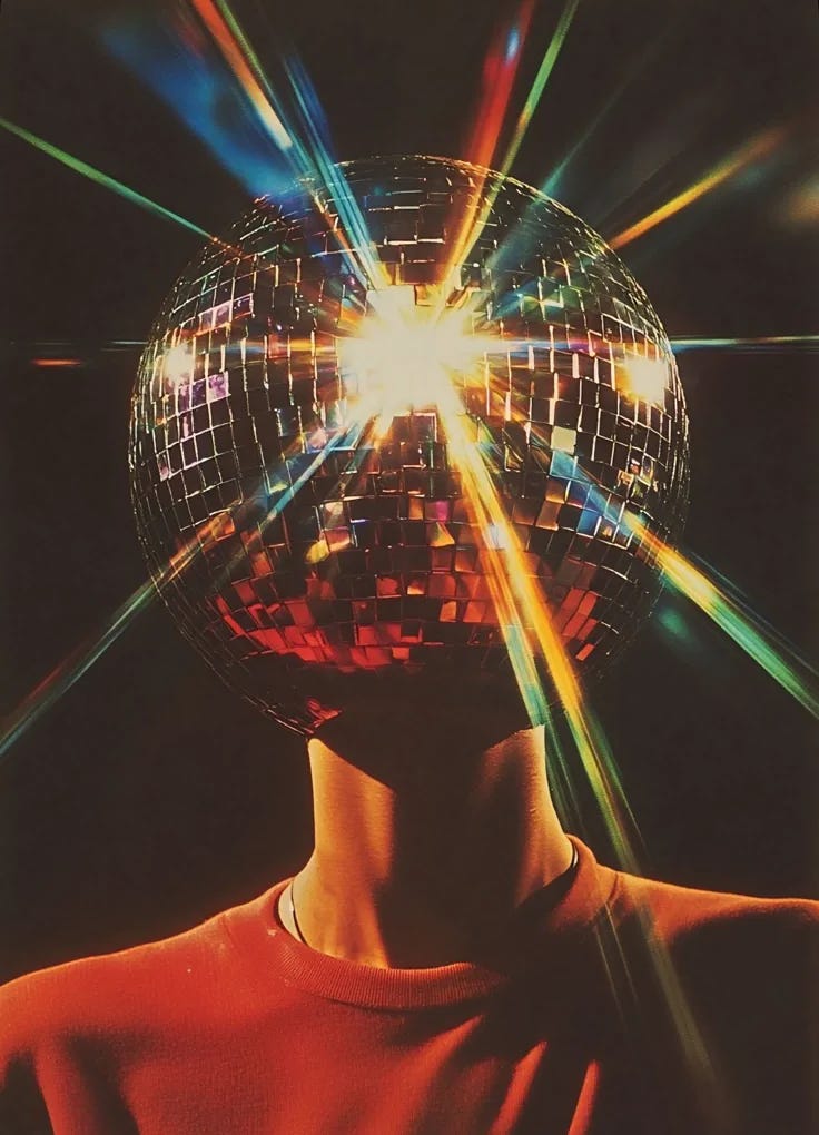 This may contain: a person with a disco ball on their head