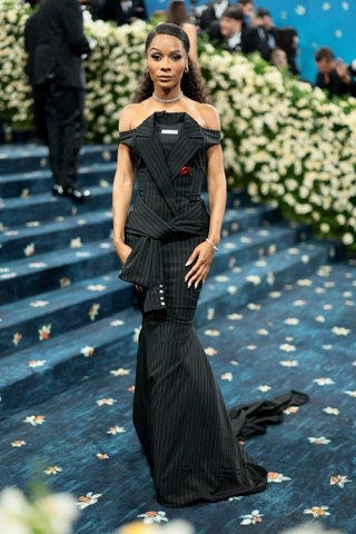 Image may contain Zuri Hall Adult Person Formal Wear Accessories Bracelet Jewelry Necklace Clothing and Dress