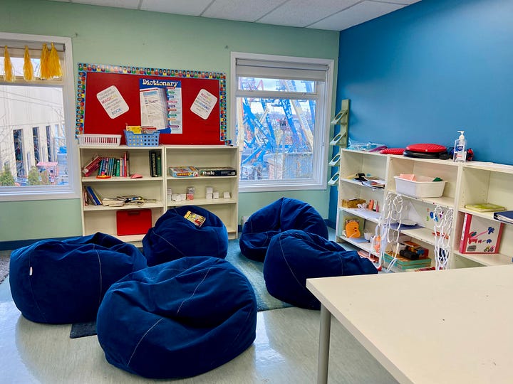Two images of a classroom, one featuring an exercise bike and the other 5 blue beanbags in a circle.