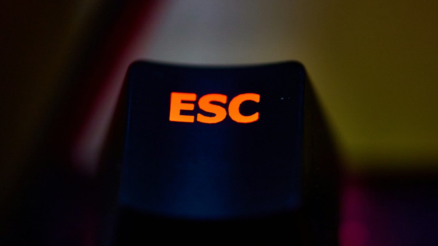 Illuminated escape key Illuminated escape key