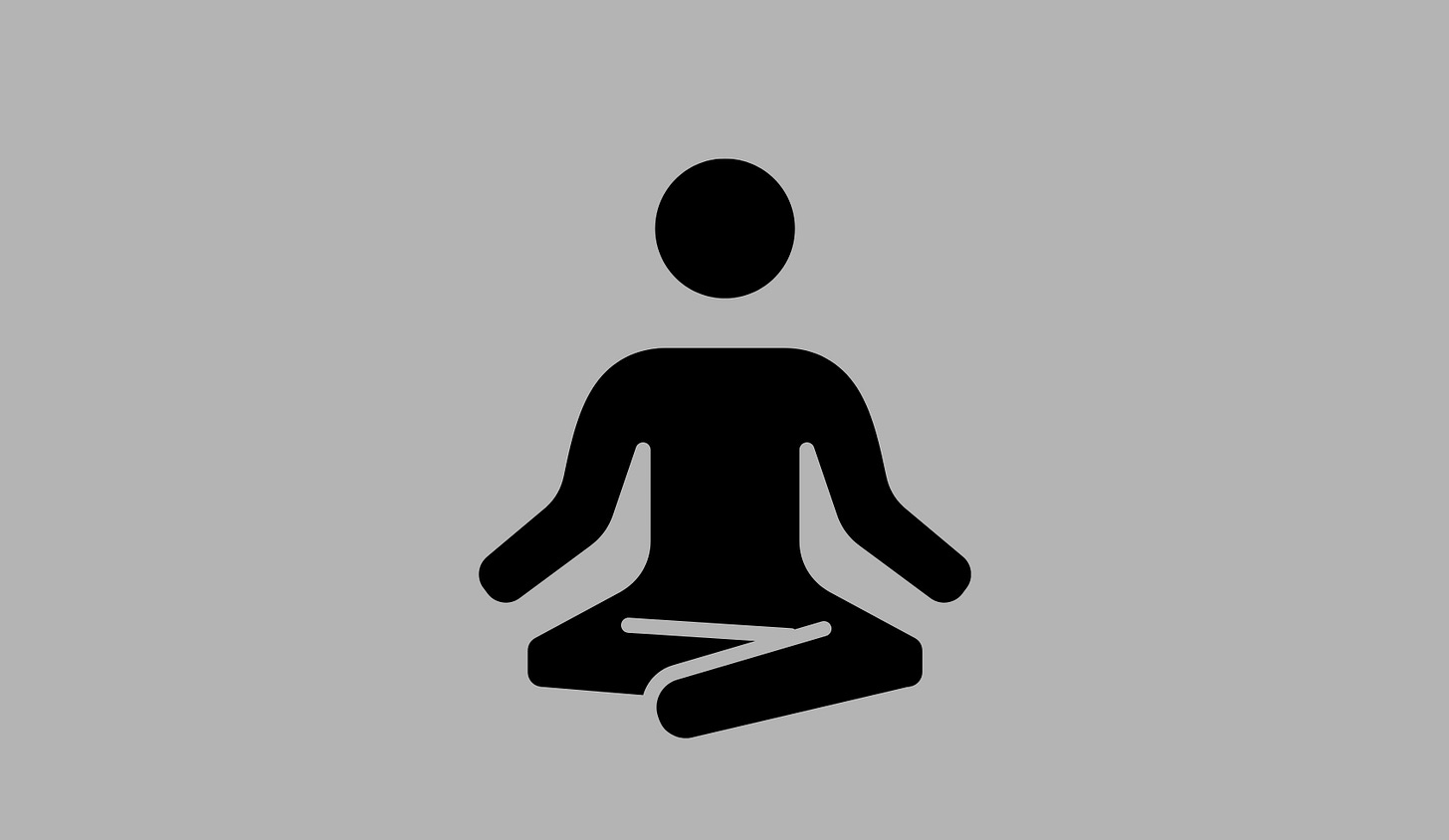 A solid black graphic of a person sitting in a meditative cross-legged position.