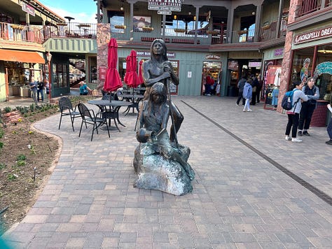 statues, mountains, people, roads