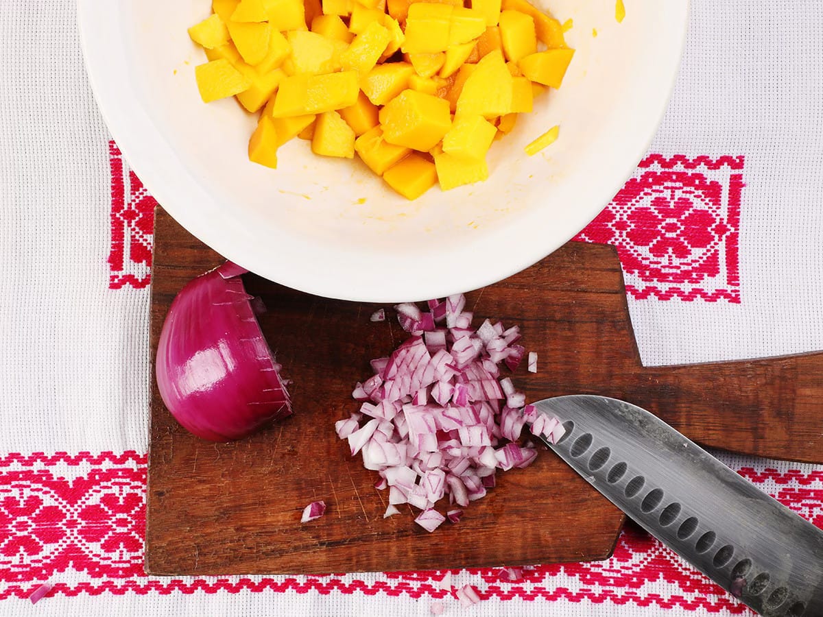 chopped red onion on cutting board