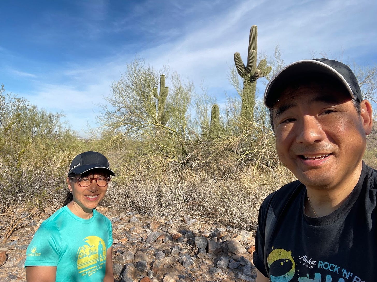 Marsha Pao and Stephen Pao with cacti in Scottsdale