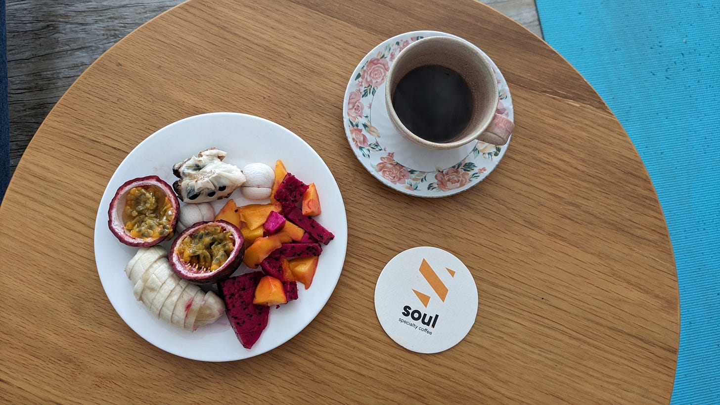 morning fruit plate overhead and coffee