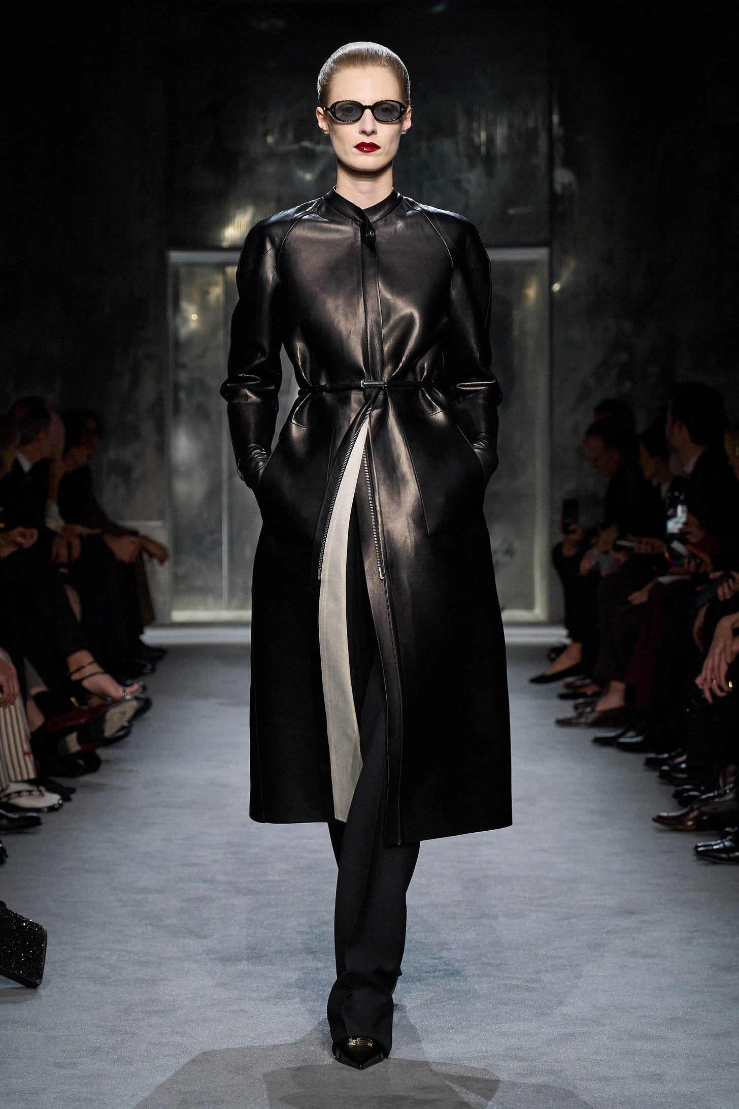 Image may contain Clothing Coat Fashion Footwear Shoe Overcoat Accessories Glasses Adult Person and Long Sleeve