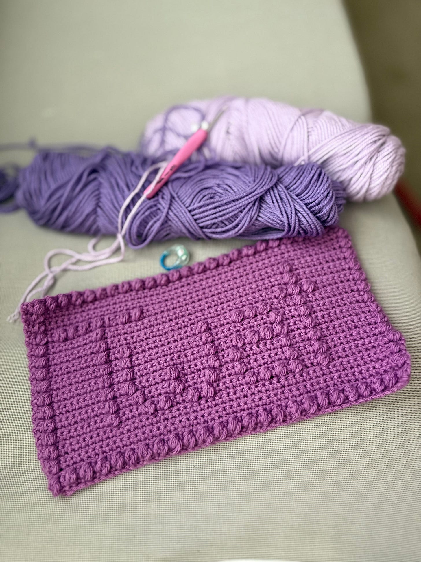 crochet yarn on sofa