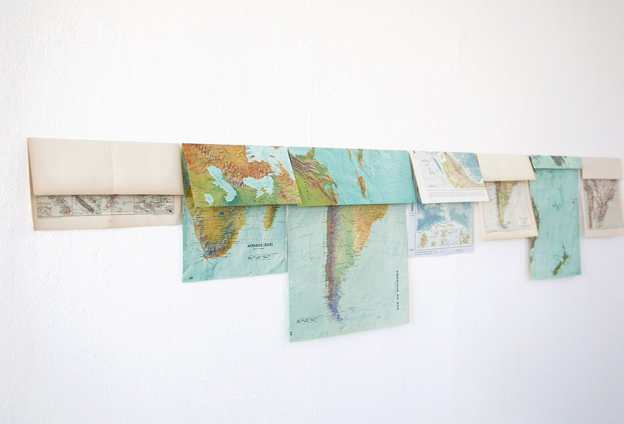 Marina Camargo, Ao sul (abaixo da linha do Equador), (installation with maps), 2015 [Galeria Superfí­cie, São Paulo. © Marina Camargo]