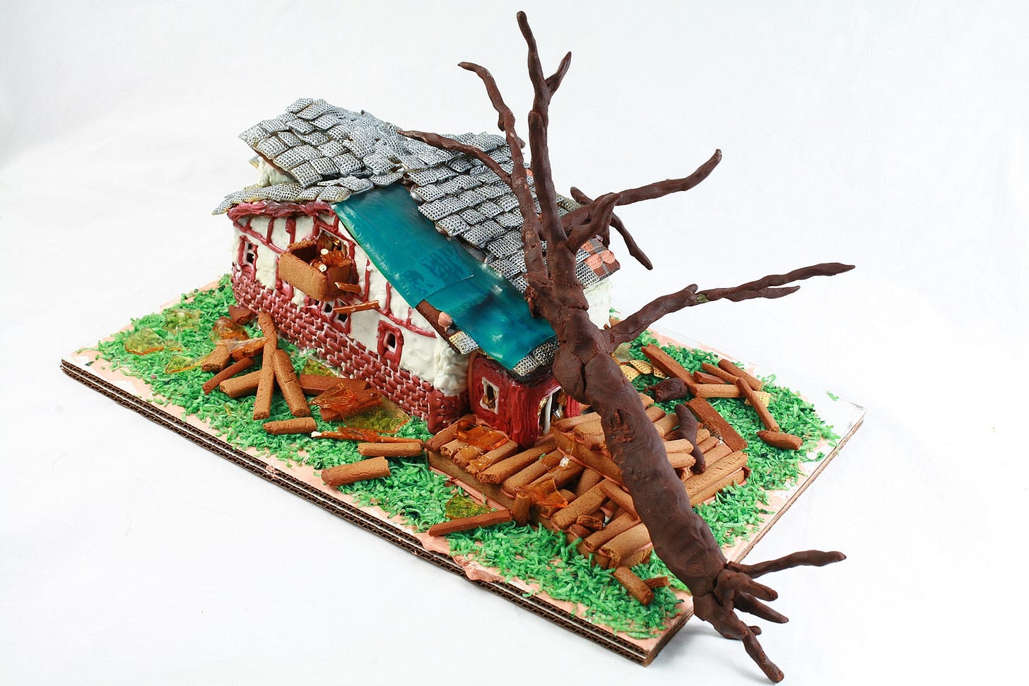 A tree falling on a gingerbread house A tree falling on a gingerbread house