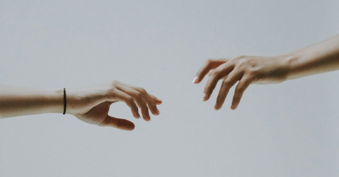 two hands about to hold wallpaper two hands about to hold wallpaper