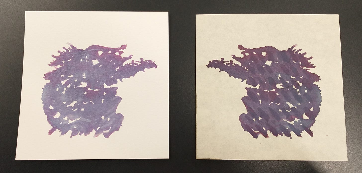 Photo of two abstract artworks, darker one on the right, lighter one on the left
