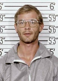 American serial killer and sex offender Jeffery Dahmer in a mugshot taken by the Milwaukee Police on July 23, 1991. He is wearing a gray sweater and clear glasses. American serial killer and sex offender Jeffery Dahmer in a mugshot taken by the Milwaukee Police on July 23, 1991. He is wearing a gray sweater and clear glasses.