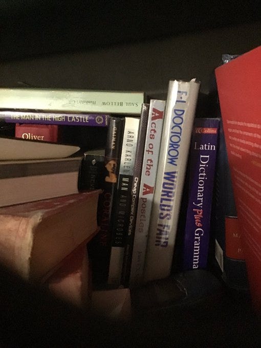 Four photos, each from a different person, showing one or more of my books on their shelves