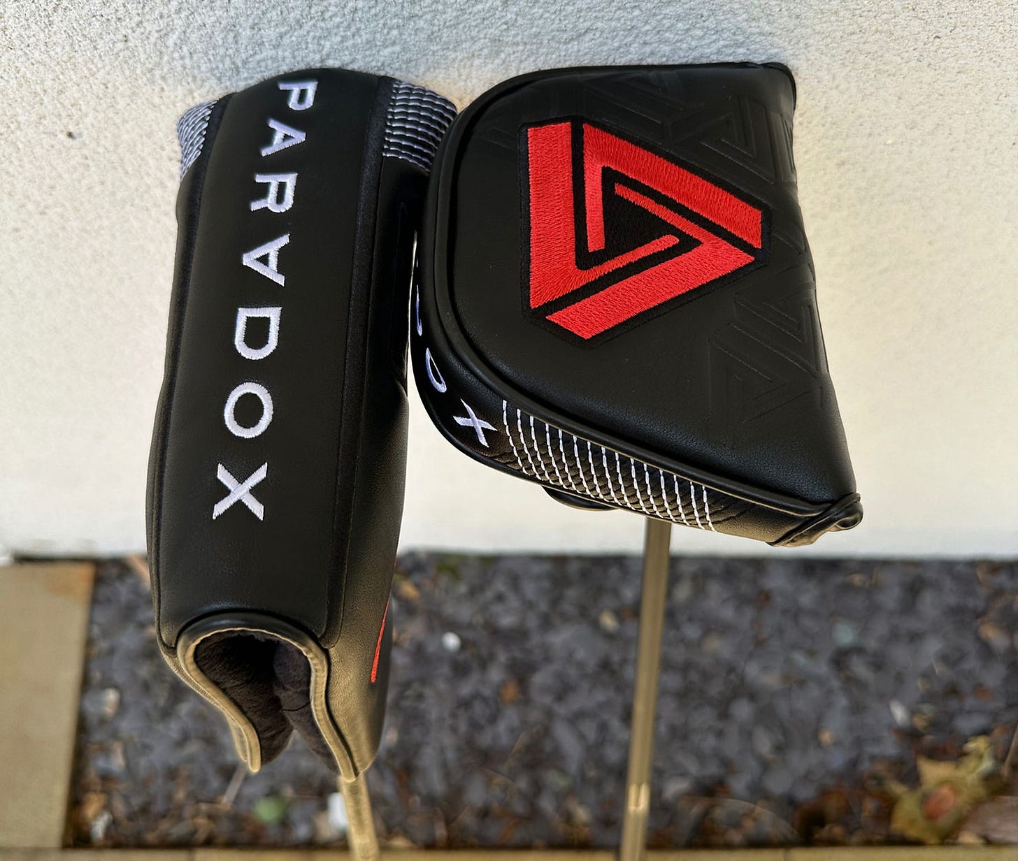 What lies beneath the head covers?